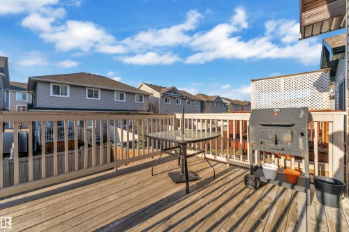Spacious wood deck with perimeter railing and privacy lattice - 5520 5 Avenue, Edmonton, AB - Outdoor With Exterior