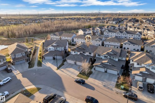 Aerial overview of a residential neighborhood featuring multiple detached and attached homes - 5520 5 Avenue, Edmonton, AB - Outdoor With View