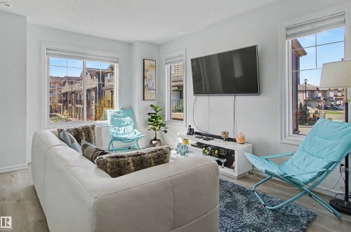 30 3025 151 Avenue, Edmonton, AB - Indoor Photo Showing Living Room