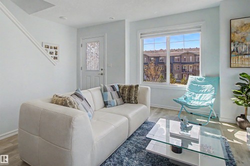30 3025 151 Avenue, Edmonton, AB - Indoor Photo Showing Living Room