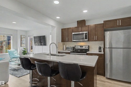 30 3025 151 Avenue, Edmonton, AB - Indoor Photo Showing Kitchen With Stainless Steel Kitchen With Double Sink With Upgraded Kitchen