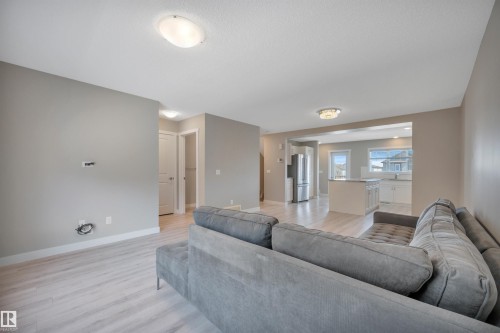 8 1530 Tamarack Boulevard, Edmonton, AB - Indoor Photo Showing Living Room