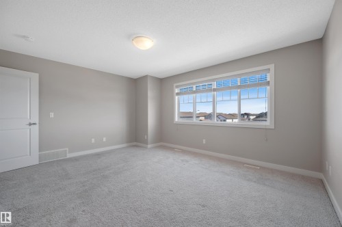 8 1530 Tamarack Boulevard, Edmonton, AB - Indoor Photo Showing Other Room