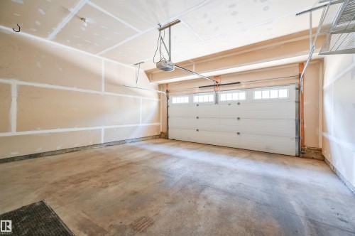 8 1530 Tamarack Boulevard, Edmonton, AB - Indoor Photo Showing Garage