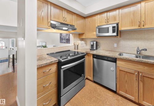 11140 83 Avenue, Edmonton, AB - Indoor Photo Showing Kitchen With Double Sink