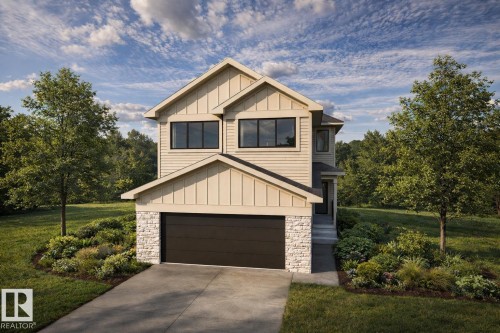 Contemporary two-story residence featuring light-toned siding and dark window frames - 20 Brickyard View, Stony Plain, AB - Outdoor