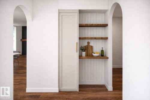 Integrated alcove shelving with wood-finish surfaces and beadboard backing - 20 Brickyard View, Stony Plain, AB - Indoor Photo Showing Other Room