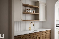 Custom cabinetry featuring a light-toned upper and a wood-finish lower - 