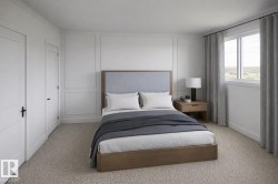 Carpeted room featuring panel molding accent walls and a window with natural light - 