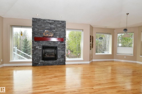 67 Shores Drive, Leduc, AB - Indoor Photo Showing Living Room With Fireplace