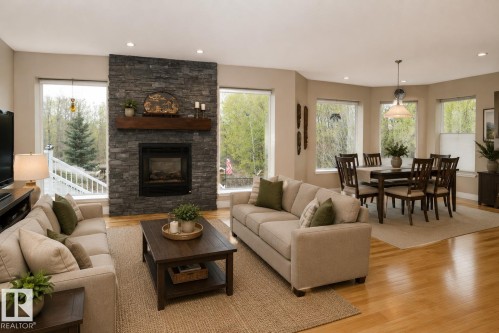 67 Shores Drive, Leduc, AB - Indoor Photo Showing Living Room With Fireplace