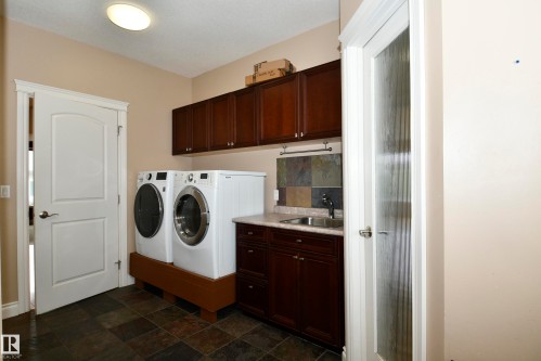 67 Shores Drive, Leduc, AB - Indoor Photo Showing Laundry Room