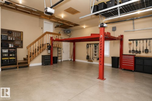 67 Shores Drive, Leduc, AB - Indoor Photo Showing Garage