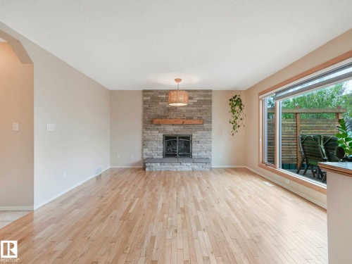 1060 Wedgewood Boulevard, Edmonton, AB - Indoor Photo Showing Living Room With Fireplace