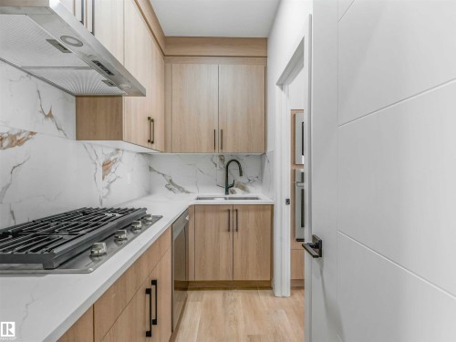 731 30 Street, Edmonton, AB - Indoor Photo Showing Kitchen With Double Sink