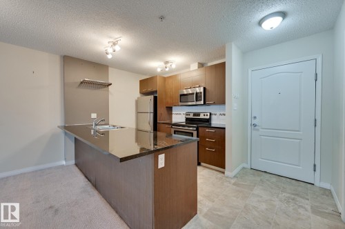3104 9351 Simpson Drive, Edmonton, AB - Indoor Photo Showing Kitchen With Double Sink