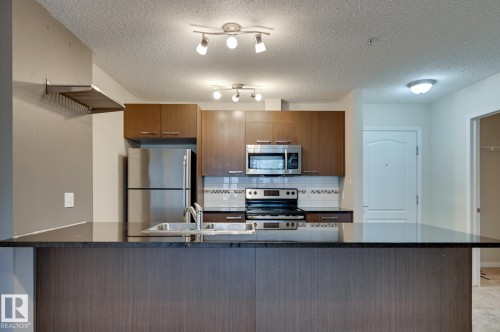 3104 9351 Simpson Drive, Edmonton, AB - Indoor Photo Showing Kitchen With Double Sink