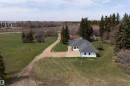 Ranch-style residence featuring a white exterior and a dark shingle roof - 19403 Fort Road, Edmonton, AB  - Outdoor With View 