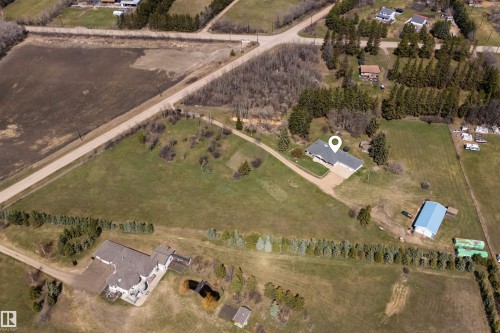 Aerial perspective showcasing a single-story residence with a gray roof and light-colored siding, positioned on a large lot - 19403 Fort Road, Edmonton, AB - Outdoor With View