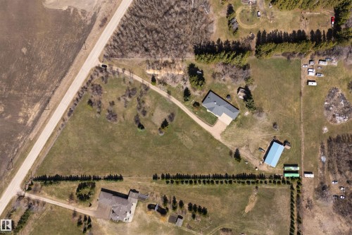 Aerial Survey. Documenting the property's structures and land use patterns - 19403 Fort Road, Edmonton, AB -  With View