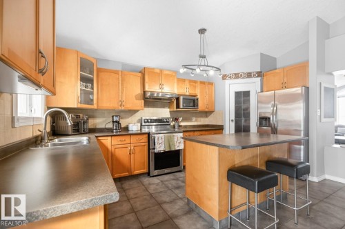 13419 140 Avenue, Edmonton, AB - Indoor Photo Showing Kitchen With Double Sink