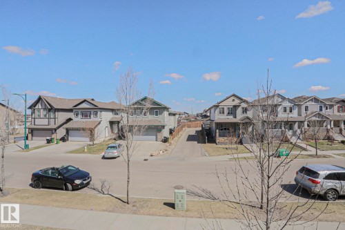 Suburban streetscape featuring a Private view - 1622 33A Street Nw, Edmonton, AB - Outdoor With Facade