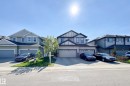 Contemporary two-story residence featuring a neutral exterior palette with dark trim accents - 1221 27 Street, Edmonton, AB  - Outdoor With Facade 