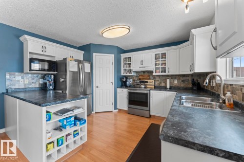 616 20 Street, Cold Lake, AB - Indoor Photo Showing Kitchen With Double Sink