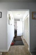 Rather than a front door that just enters into the living space, this proper entrance is a welcome treat, especially in a busy household.  Lots of room for shoes, boots, and coats - 