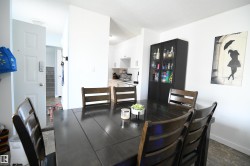 Townhomes often lack a large eating area.  Not here.  This unit features a large, family sized dining room, that easily supports a proper, family sized table.  A large window also looks out into the private yard and patio area - 