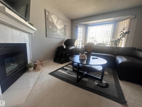 1636 Jamha Road, Edmonton, AB - Indoor Photo Showing Living Room With Fireplace