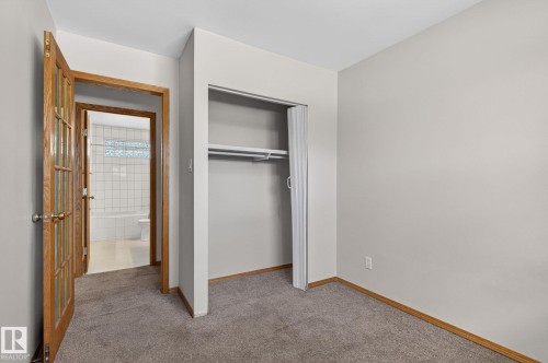 Room featuring textured gray carpet and light gray wall paint - 13412 108 Street, Edmonton, AB - Indoor Photo Showing Other Room
