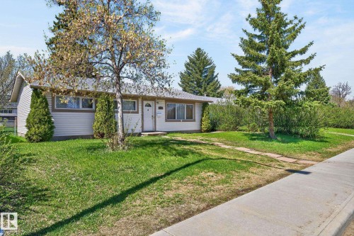 Ranch-style residence featuring light-colored siding and a contrasting roof - 13412 108 Street, Edmonton, AB - Outdoor