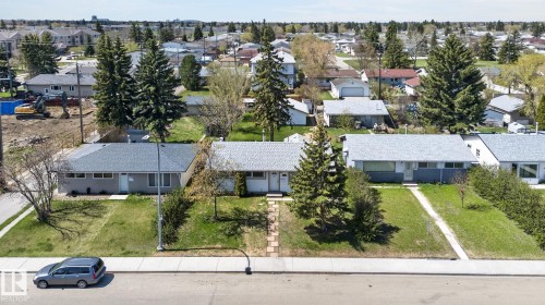 Light grey single-story residence with a dark grey shingled roof - 13412 108 Street, Edmonton, AB - Outdoor