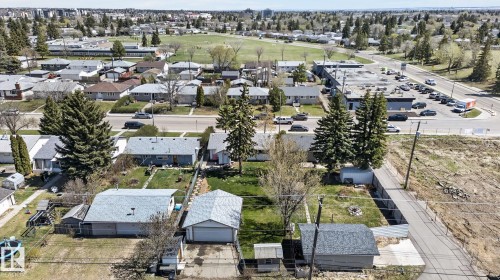 Residential neighborhood featuring single-story homes with pitched roofs, mature trees, and paved streets - 13412 108 Street, Edmonton, AB - Outdoor With View