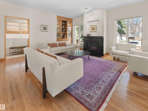 10725 University Avenue, Edmonton, AB - Indoor Photo Showing Living Room With Fireplace
