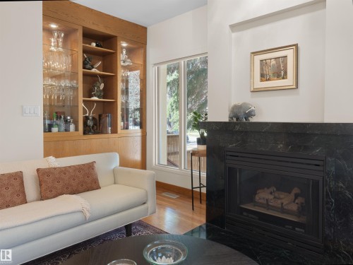 10725 University Avenue, Edmonton, AB - Indoor Photo Showing Living Room With Fireplace