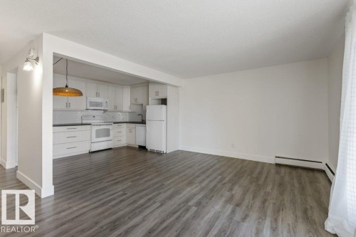 Open-concept living space; Carpet-Free Condo! - 101 8604 Gateway Boulevard, Edmonton, AB - Indoor