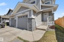 Contemporary exterior featuring horizontal siding and stone accents - 1211 29 Street, Edmonton, AB  - Outdoor 