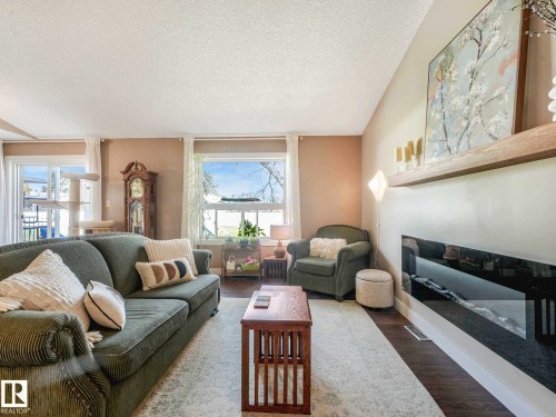 1809 Mill Woods Road E, Edmonton, AB - Indoor Photo Showing Living Room With Fireplace