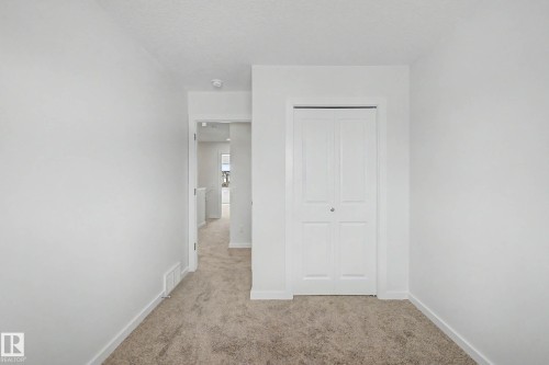 Neutral-toned carpeting throughout - 720 Southfork Drive, Leduc, AB - Indoor