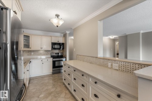 506 9929 113 Street, Edmonton, AB - Indoor Photo Showing Kitchen With Stainless Steel Kitchen
