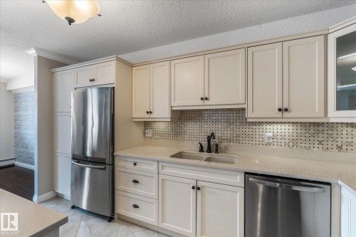 506 9929 113 Street, Edmonton, AB - Indoor Photo Showing Kitchen With Stainless Steel Kitchen With Double Sink With Upgraded Kitchen