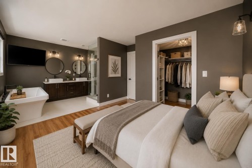 Integrated bedroom and bathroom space featuring wood-finish flooring, a freestanding soaking tub, a dual vanity with vessel sinks, a glass-enclosed shower, and a built-in closet with shelving and hanging rods - 126 Harrison Drive, Edmonton, AB - Indoor Photo Showing Bedroom