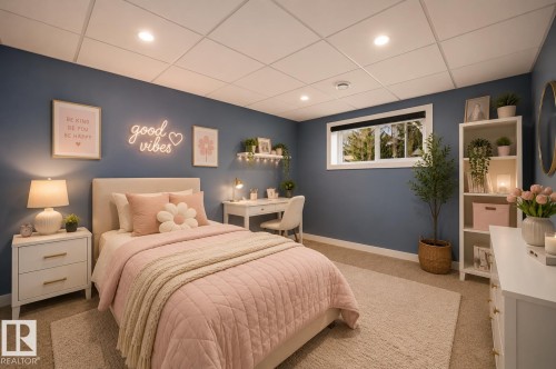 Bedroom featuring blue painted walls, carpeted flooring, a built-in window, recessed lighting, and a drop ceiling - 126 Harrison Drive, Edmonton, AB - Indoor Photo Showing Bedroom