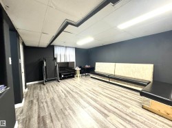 Misc room featuring a paneled ceiling - 