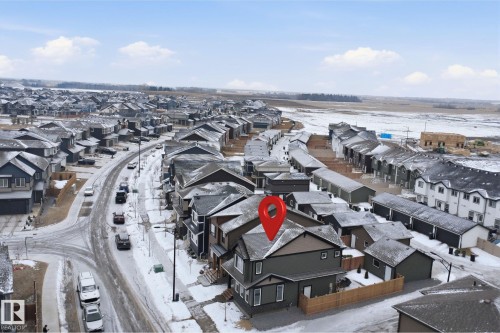 The property is situated within a developed residential community, offering convenient access to local roads - 4047 Hawthorn Link Link, Edmonton, AB - Outdoor With View