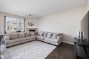 504 Sturtz Link, Leduc, AB  - Indoor Photo Showing Living Room With Fireplace 