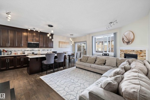 504 Sturtz Link, Leduc, AB - Indoor Photo Showing Other Room With Fireplace