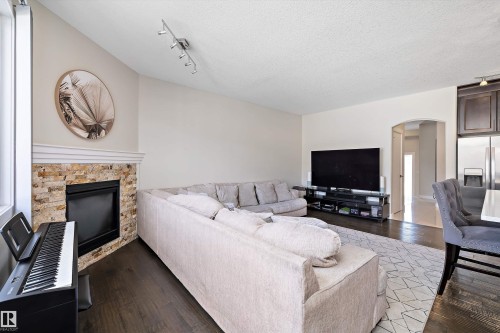 504 Sturtz Link, Leduc, AB - Indoor Photo Showing Living Room With Fireplace